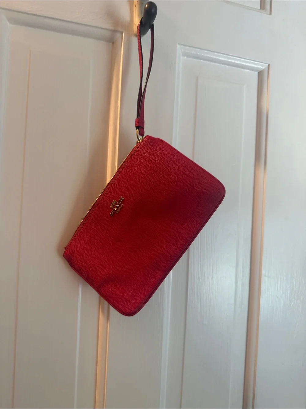 Coach Pink Pebbled Leather Wristlet with Gold Hardware